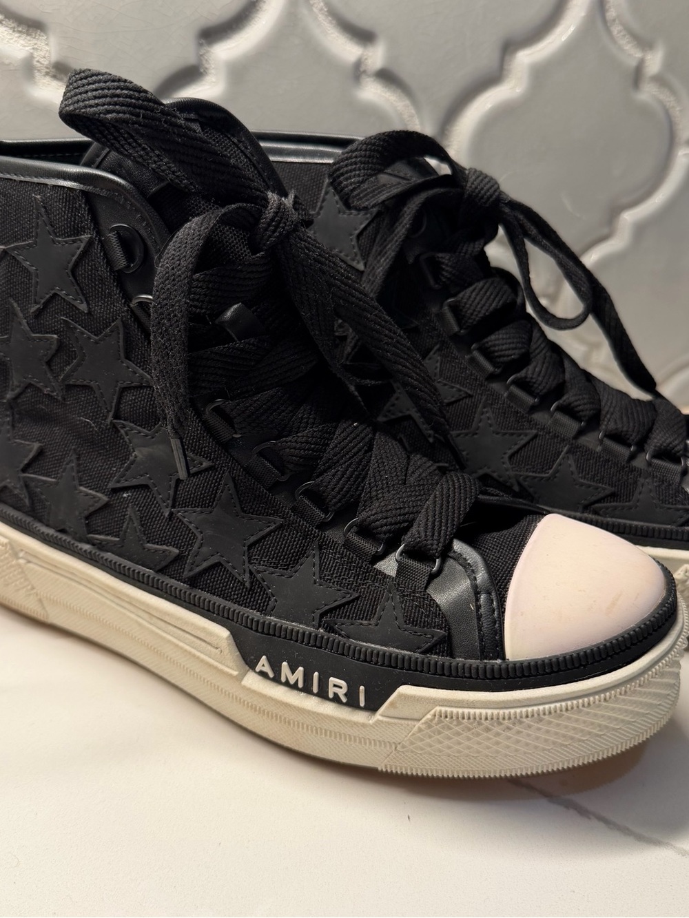 AMIRI Black High-Top Star-Textured Sneaker with White Toe Cap